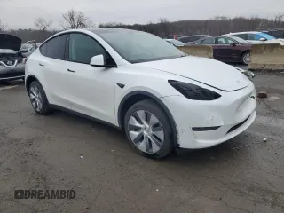 2023 Tesla Model Y Long Range with VIN 7SAYGDEEXPA122953, listed as a Copart auction lot 52627095 with Not Provided miles and Salvage Title. Bid and sale history available at DreamBid. Image 4.