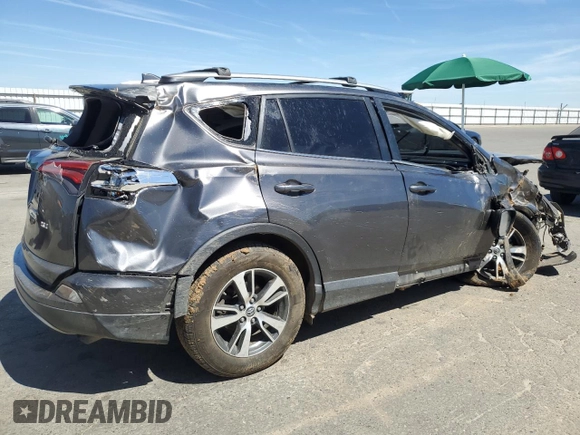 2018 Toyota RAV4 XLE with VIN JTMWFREV6JJ172451, listed as a Copart auction lot 58095775 with Not provided miles and Salvage title. Bid and sale history available at DreamBid. Image 3.