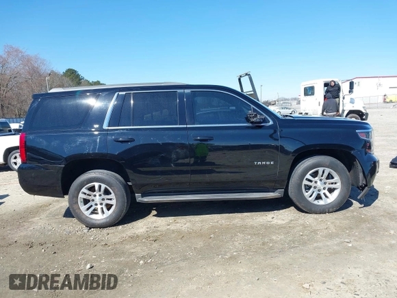 2018 Chevrolet Tahoe LT z VIN 1GNSCBKC7JR254859, wystawiony jako IAAI lot #41620074 z przebiegiem 124 714 mil mil oraz . Historia ofert i sprzedaży dostępna na DreamBid. Obrazek 13.
