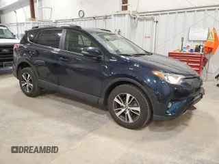 2018 Toyota RAV4 XLE with VIN JTMRFREV2JD254334, listed as a Copart auction lot 53079335 with 27,717 mi miles and Clean Title. Bid and sale history available at DreamBid. Image 4.