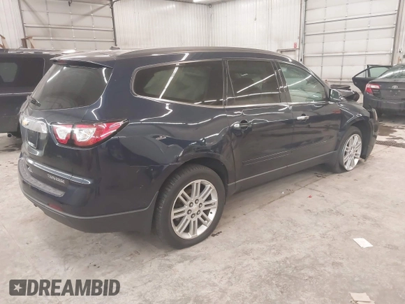 2015 Chevrolet Traverse LT with VIN 1GNKVGKDXFJ310363, listed as a IAAI auction lot 41044106 with 174,139 mi miles and . Bid and sale history available at DreamBid. Image 4.