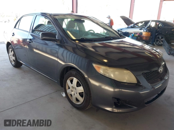 2009 Toyota Corolla with VIN JTDBL40E69J036916, listed as a IAAI auction lot 41776387 with 185,749 mi miles. Bid and sale history available at carsss.com. Image 1.