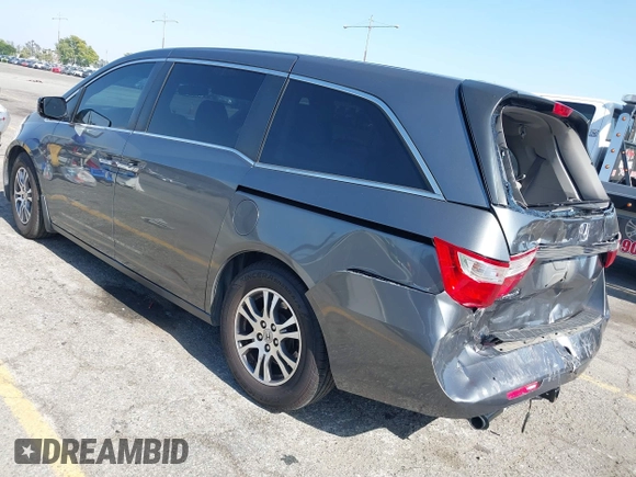 2011 Honda Odyssey EX-L with VIN 5FNRL5H64BB070836, listed as a IAAI auction lot 42520878 with 162,316 mi miles and . Bid and sale history available at DreamBid. Image 3.