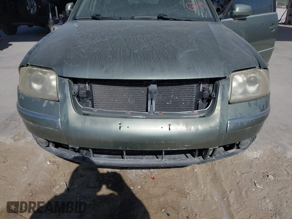 2004 Volkswagen Passat GLS z VIN WVWVD63BX4E011218, wystawiony jako IAAI lot #41308619 z przebiegiem 178 579 mil mil oraz . Historia ofert i sprzedaży dostępna na DreamBid. Obrazek 6.