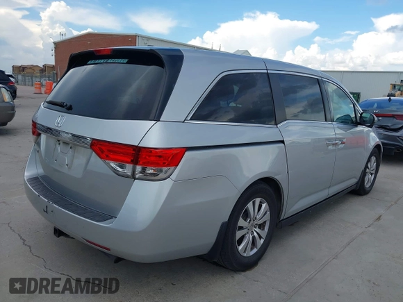 2014 Honda Odyssey EX-L with VIN 5FNRL5H60EB058753, listed as a IAAI auction lot 42595221 with 194,995 mi miles and . Bid and sale history available at DreamBid. Image 4.