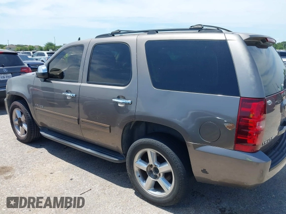 2011 Chevrolet Tahoe LS with VIN 1GNSCAE00BR343816, listed as a IAAI auction lot 42363718 with 253,212 mi miles and . Bid and sale history available at DreamBid. Image 14.