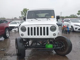 2013 Jeep Wrangler Sport with VIN 1C4AJWAG8DL601399, listed as a IAAI auction lot 42186399 with 130,195 mi miles and . Bid and sale history available at DreamBid. Image 13.