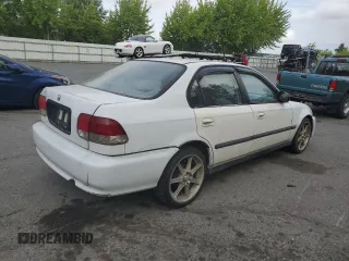 1997 Honda Civic DX z VIN JHMEJ6525VS009951, wystawiony jako Copart lot #60757545 z przebiegiem 205 070 mil mil oraz Czysty tytuł • Clean title. Historia ofert i sprzedaży dostępna na DreamBid. Obrazek 3.