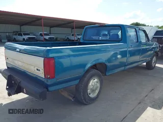 1994 Ford F-350 with VIN 1FTJW35K2REA09247, listed as a IAAI auction lot 42700543 with 157,000 mi miles and . Bid and sale history available at DreamBid. Image 4.