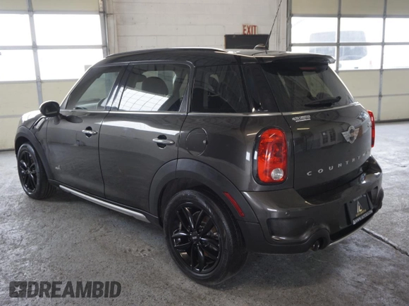 2016 MINI Countryman S with VIN WMWZC5C55GWU00997, listed as a Copart auction lot 58840965 with 41,217 mi miles and Salvage title. Bid and sale history available at DreamBid. Image 4.