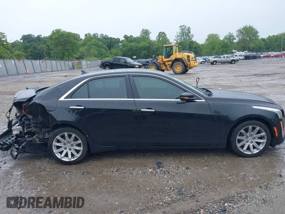 2014 Cadillac CTS AWD z VIN 1G6AW5SX4E0129136, wystawiony jako IAAI lot #42364098 z przebiegiem 137 080 mil mil oraz . Historia ofert i sprzedaży dostępna na DreamBid. Obrazek 13.