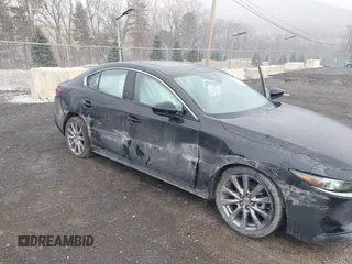 2022 Mazda 3 Premium with VIN 3MZBPADL7NM316513, listed as a IAAI auction lot 41347291 with 47,351 mi miles and . Bid and sale history available at DreamBid. Image 6.