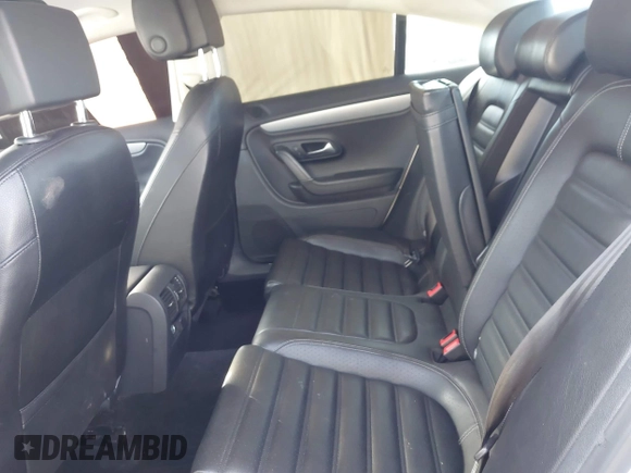 2013 Volkswagen CC Sport with VIN WVWBN7AN3DE553523, listed as a IAAI auction lot 41661320 with 95,085 mi miles and . Bid and sale history available at DreamBid. Image 8.