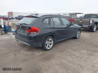 2014 BMW X1 sDrive28i with VIN WBAVM1C58EVW48622, listed as a IAAI auction lot 41531855 with 90,102 mi miles. Bid and sale history available at carsss.com. Image 4.