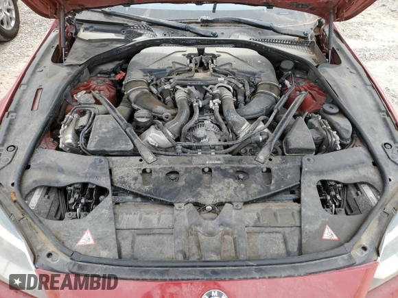 2013 BMW 6 Series 650i with VIN WBA6B2C50DDG66703, listed as a Copart auction lot 82225824 with 199,076 mi miles and Salvage Title. Bid and sale history available at DreamBid. Image 11.