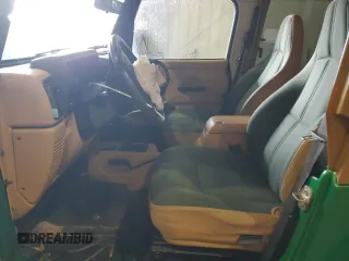 1998 Jeep Wrangler Sahara z VIN 1J4FY49S6WP730035, wystawiony jako Copart lot #59100505 z przebiegiem 225 354 mil mil oraz Szkoda całkowita • Salvage title. Historia ofert i sprzedaży dostępna na DreamBid. Obrazek 7.