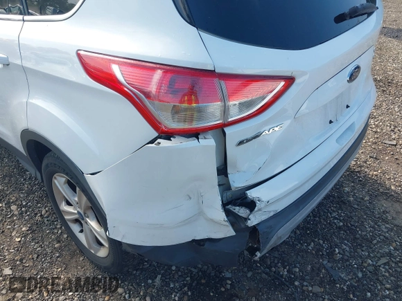 2013 Ford Escape SE with VIN 1FMCU9GX4DUB59039, listed as a IAAI auction lot 42722871 with 93,188 mi miles and . Bid and sale history available at DreamBid. Image 6.