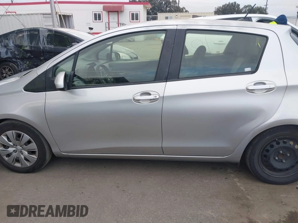 2012 Toyota Yaris L with VIN JTDKTUD30CD525956, listed as a IAAI auction lot 42057788 with 191,307 mi miles. Bid and sale history available at carsss.com. Image 14.