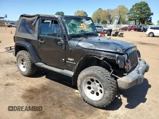 2007 Jeep Wrangler Sahara z VIN 1J4FA54177L183617, wystawiony jako Copart lot #49660785 z przebiegiem 178 846 mil mil oraz Szkoda całkowita • Salvage title. Historia ofert i sprzedaży dostępna na DreamBid. Obrazek 4.