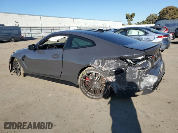 2023 BMW M4 Competition with VIN WBS33AZ01PCM59701, listed as a Copart auction lot 83067984 with 26,200 mi miles and Salvage Title. Bid and sale history available at carsss.com. Image 2.