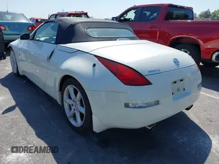 2005 Nissan 350Z Touring z VIN JN1AZ36A45M759863, wystawiony jako IAAI lot #41989643 z przebiegiem 36 758 mil mil oraz . Historia ofert i sprzedaży dostępna na DreamBid. Obrazek 3.