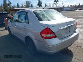 2009 Nissan Versa 1.8 S with VIN 3N1BC11E19L375222, listed as a IAAI auction lot 41736533 with 197,946 mi miles. Bid and sale history available at carsss.com. Image 3.