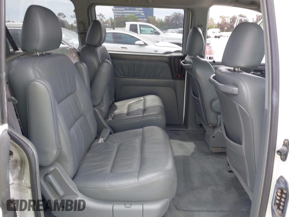 2003 Honda Odyssey EX-L with VIN 5FNRL18973B113215, listed as a IAAI auction lot 42052917 with Not Provided miles and . Bid and sale history available at DreamBid. Image 8.
