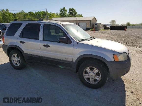 2002 Ford Escape XLT Choice with VIN 1FMCU04162KB00207, listed as a Copart auction lot 56414275 with 143,085 mi miles and Salvage title. Bid and sale history available at DreamBid. Image 4.