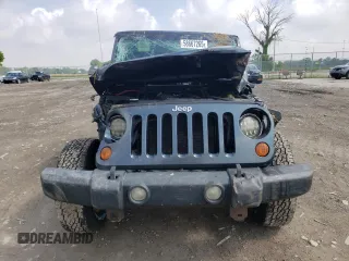 2008 Jeep Wrangler X with VIN 1J4FA24158L563572, listed as a Copart auction lot 58667265 with 162,649 mi miles and Salvage title. Bid and sale history available at DreamBid. Image 5.