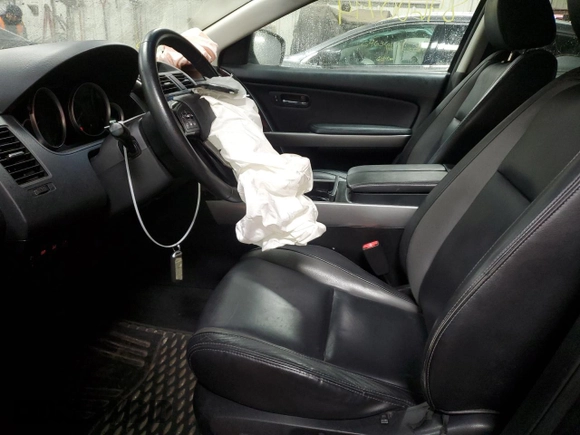2011 Mazda CX-9 Grand Touring z VIN JM3TB3DV6B0305687, wystawiony jako Copart lot #84600794 z przebiegiem 145 844 mil mil oraz Szkoda całkowita • Salvage title. Historia ofert i sprzedaży dostępna na DreamBid. Obrazek 7.