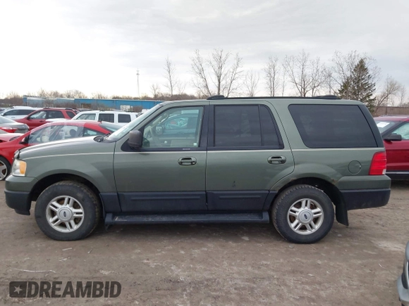 2004 Ford Expedition Special Service with VIN 1FMPU16L64LB74097, listed as a IAAI auction lot 41938850 with 168,436 mi miles. Bid and sale history available at carsss.com. Image 14.