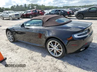2013 Aston Martin Vantage z VIN SCFEKBBK1DGD17118, wystawiony jako Copart lot #60636224 z przebiegiem 50 591 mil mil oraz Szkody całkowita. Historia ofert i sprzedaży dostępna na DreamBid. Obrazek 2.