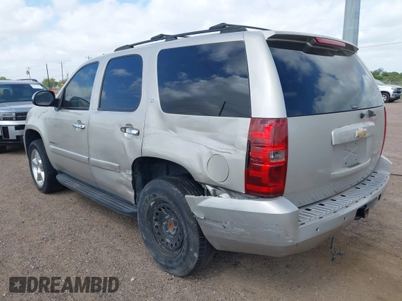 2007 Chevrolet Tahoe LT with VIN 1GNFC13047R176064, listed as a IAAI auction lot 42507367 with 245,075 mi miles and . Bid and sale history available at DreamBid. Image 3.