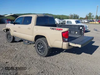 2018 Toyota Tacoma SR z VIN 3TMCZ5AN7JM125425, wystawiony jako IAAI lot #40459066 z przebiegiem 85 182 mil mil oraz . Historia ofert i sprzedaży dostępna na DreamBid. Obrazek 3.