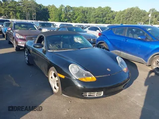 2002 Porsche Boxster with VIN WP0CA29842U623048, listed as a IAAI auction lot 42773428 with 136,067 mi miles and . Bid and sale history available at DreamBid. Image 1.