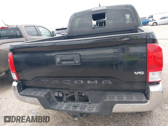 2017 Toyota Tacoma SR5 with VIN 5TFAZ5CN8HX052459, listed as a IAAI auction lot 41495281 with 212,314 mi miles and . Bid and sale history available at DreamBid. Image 16.