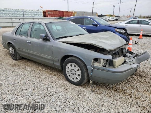 2004 Mercury Grand Marquis GS with VIN 2MEFM74W44X659873, listed as a Copart auction lot 51793205 with 115,384 mi miles and Salvage Title. Bid and sale history available at DreamBid. Image 4.