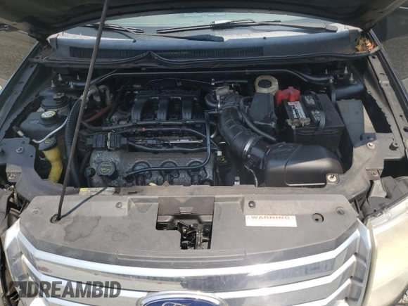 2008 Ford Taurus X SEL with VIN 1FMDK02W08GA29428, listed as a Copart auction lot 58902675 with 256,008 mi miles and Salvage title. Bid and sale history available at DreamBid. Image 11.