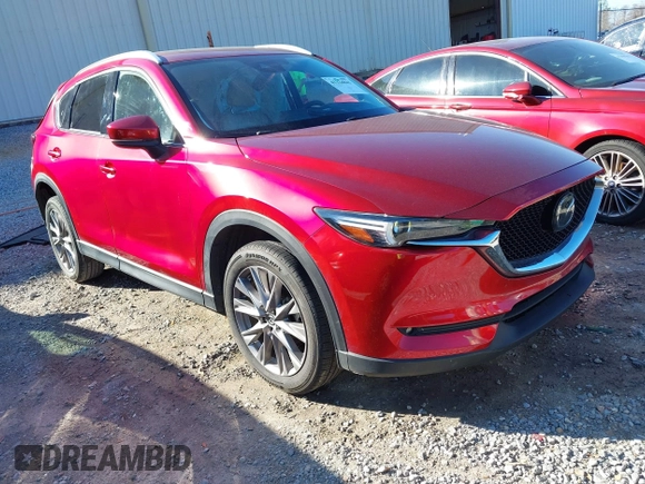 2020 Mazda CX-5 Grand Touring with VIN JM3KFADM8L0846818, listed as a IAAI auction lot 41224843 with 123,554 mi miles. Bid and sale history available at carsss.com. Image 1.
