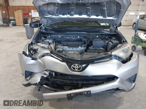 2017 Toyota RAV4 LE with VIN 2T3BFREV6HW642228, listed as a IAAI auction lot 41832543 with 127,830 mi miles. Bid and sale history available at carsss.com. Image 6.