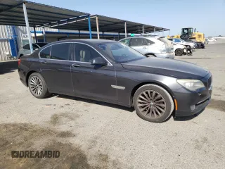 2012 BMW 7 Series 740i with VIN WBAKA4C54CC613419, listed as a Copart auction lot 54420885 with 104,006 mi miles and Salvage Title. Bid and sale history available at carsss.com. Image 4.