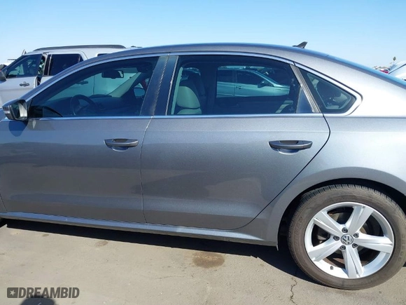 2014 Volkswagen Passat SE w/Sunroof with VIN 1VWBT7A34EC110750, listed as a IAAI auction lot 41754525 with 101,416 mi miles. Bid and sale history available at carsss.com. Image 14.