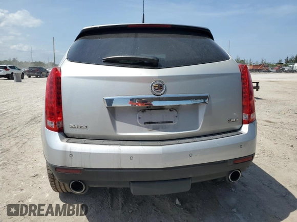 2012 Cadillac SRX Performance Collection z VIN 3GYFNBE34CS512362, wystawiony jako Copart lot #57406495 z przebiegiem 102 226 mil mil oraz Szkoda całkowita • Salvage title. Historia ofert i sprzedaży dostępna na DreamBid. Obrazek 6.