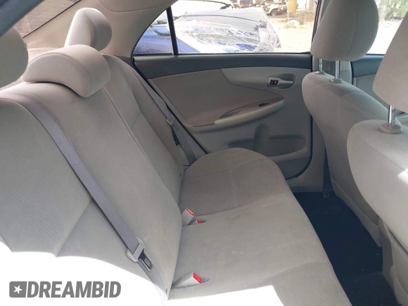 2011 Toyota Corolla L with VIN 2T1BU4EEXBC559590, listed as a IAAI auction lot 42101256 with 163,307 mi miles and . Bid and sale history available at DreamBid. Image 8.
