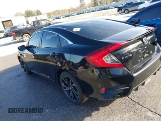 2019 Honda Civic Sport with VIN 2HGFC2F83KH567345, listed as a IAAI auction lot 41353597 with 142,857 mi miles and . Bid and sale history available at DreamBid. Image 3.