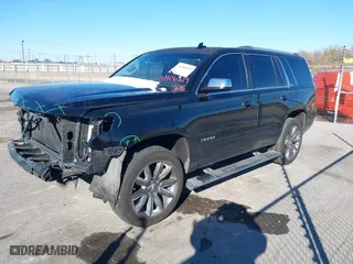 2015 Chevrolet Tahoe LTZ with VIN 1GNSCCKC8FR581994, listed as a IAAI auction lot 41406219 with 187,802 mi miles. Bid and sale history available at carsss.com. Image 14.