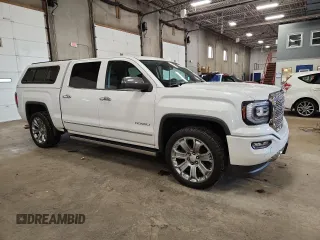 2018 GMC Sierra 1500 Denali z VIN 3GTU2PEJ2JG587157, wystawiony jako Copart lot #58516315 z przebiegiem 88 855 mil mil oraz Szkoda całkowita • Salvage title. Historia ofert i sprzedaży dostępna na DreamBid. Obrazek 4.