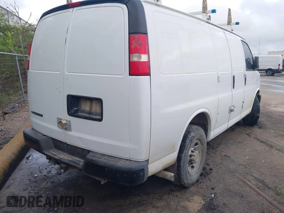 2017 Chevrolet Express Cargo Van with VIN 1GCWGAFF6H1176404, listed as a IAAI auction lot 42014572 with 104,378 mi miles. Bid and sale history available at carsss.com. Image 4.
