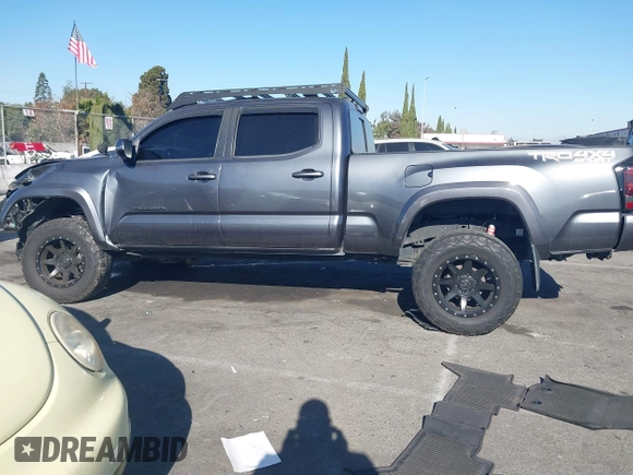 2021 Toyota Tacoma 4WD SR5 with VIN 3TMDZ5BNXMM107525, listed as a IAAI auction lot 41062698 with 41,771 mi miles. Bid and sale history available at carsss.com. Image 14.