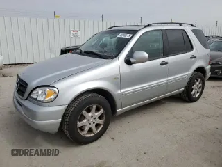 2000 Mercedes-Benz M 320/430/500 with VIN 4JGAB72E4YA218301, listed as a Copart auction lot 49968215 with 180,541 mi miles and Salvage title. Bid and sale history available at DreamBid. Image 1.